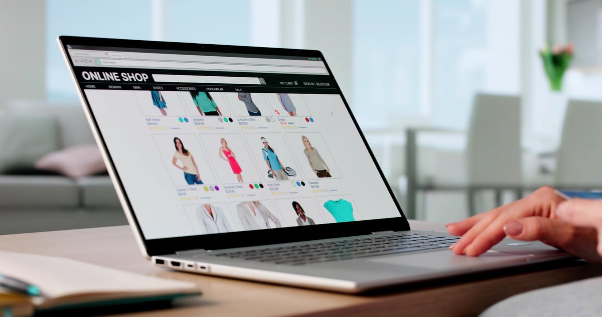 Young Woman Purchasing Clothes Online Using Credit Card Payment App. Potential Professions: Ecommerce Analyst